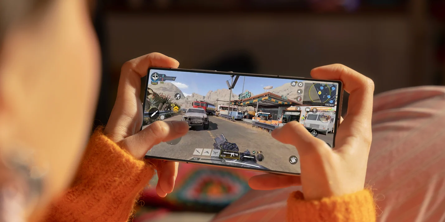 Mobile gaming demonstration shown on a smartphone screen during a technology showcase